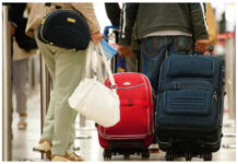 Migranti trolley viaggio trasporti